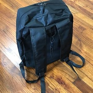 Black Canvas Backpack
Pocket for Small Item
Cushioned Adjustable Shoulder Strap